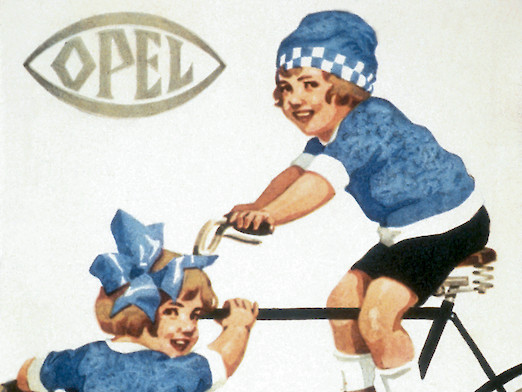 Opel Postkarten-Werbung, 1927 - ein kleiner Junge sitzt auf einem großen schwarzem Rad und ein kleines Mädchen steht davor